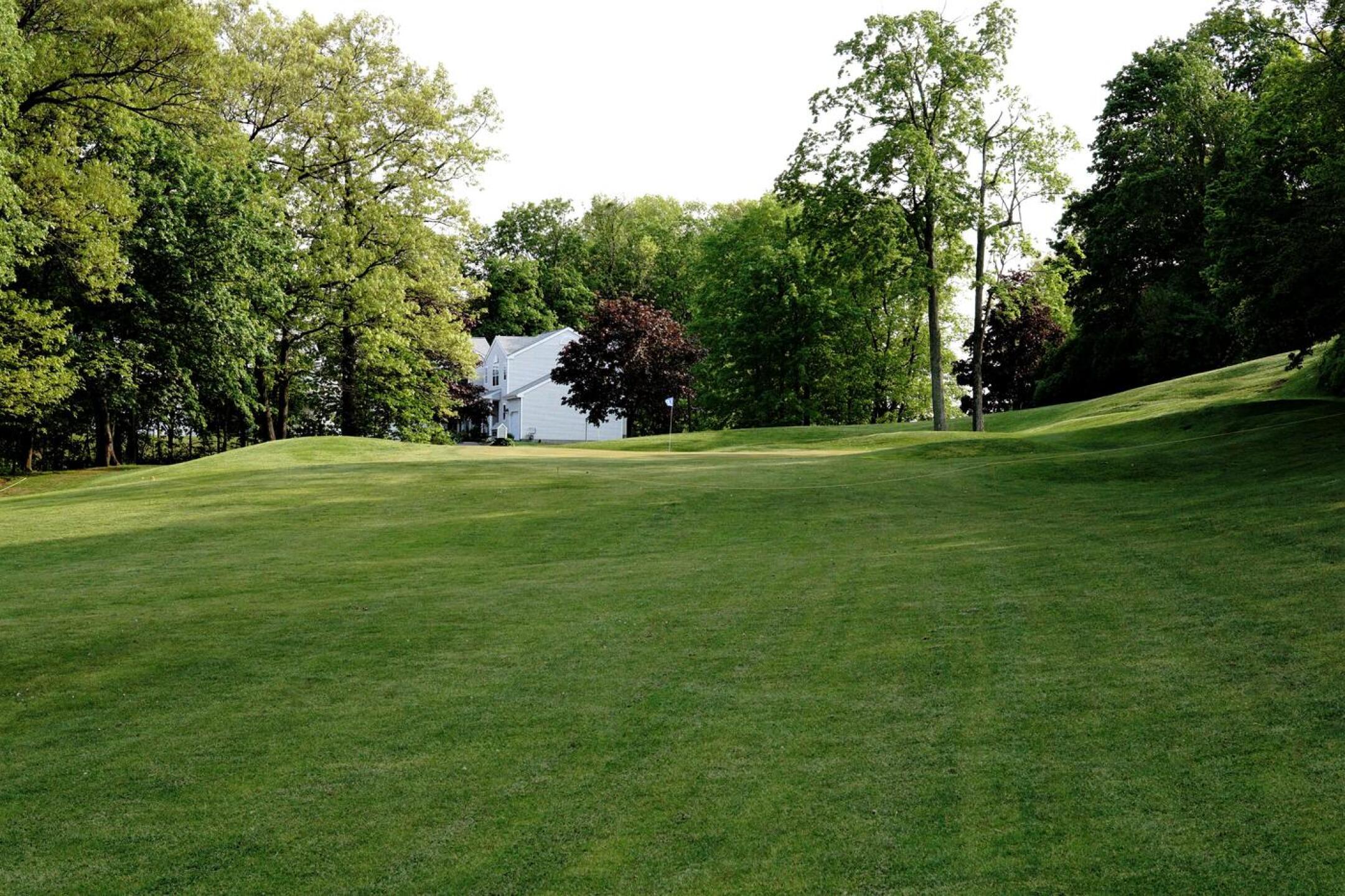 The seventh, a mid-length par-4, plays uphill to a green canted from back to front. (Photo submitted by AptlyLinked on 05/14/2023)