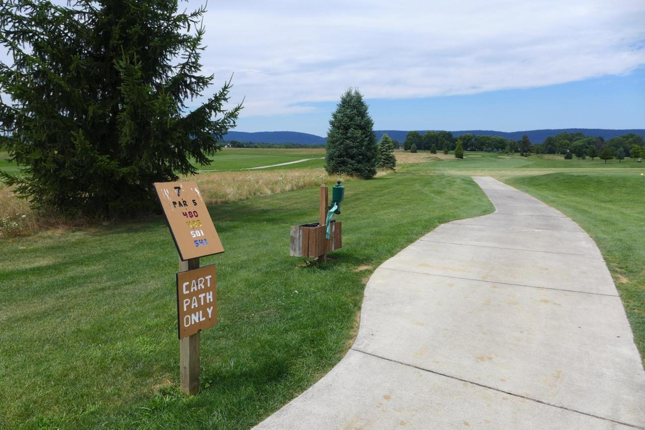 Nice cart paths - wild area between trees (Photo submitted by FrugalGolfDad on 08/21/2016)
