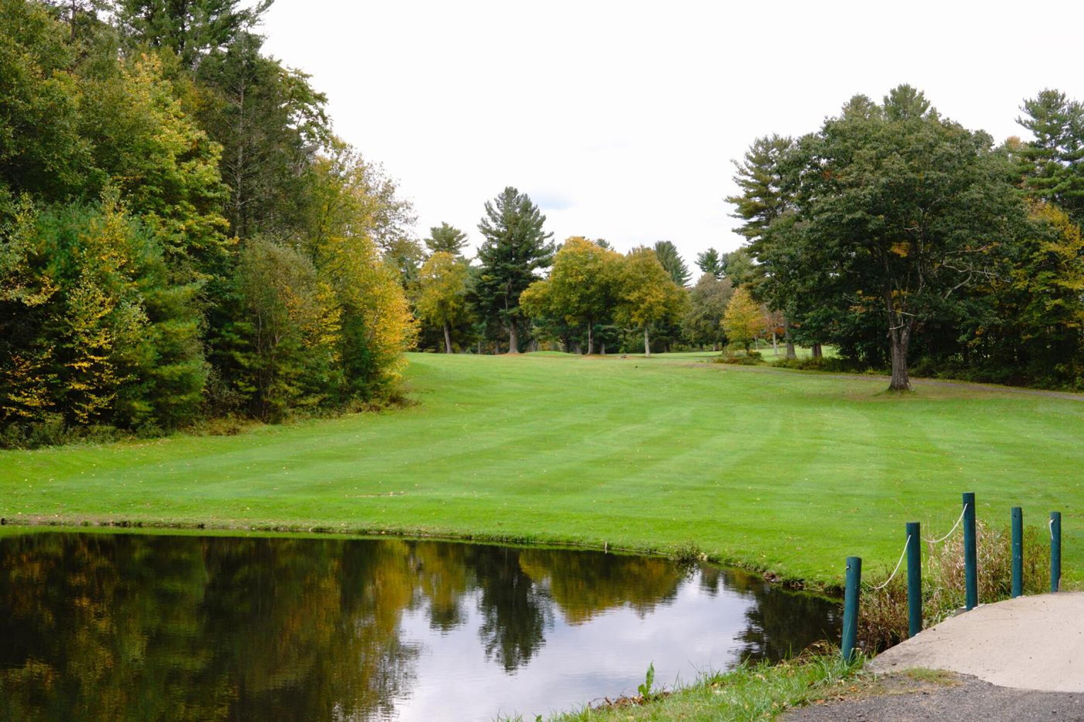 After hitting your tee shot at the long, dogleg par-5 ninth, you’ll soon cross a small bridge over this pond. (Photo submitted by AptlyLinked on 10/16/2023)