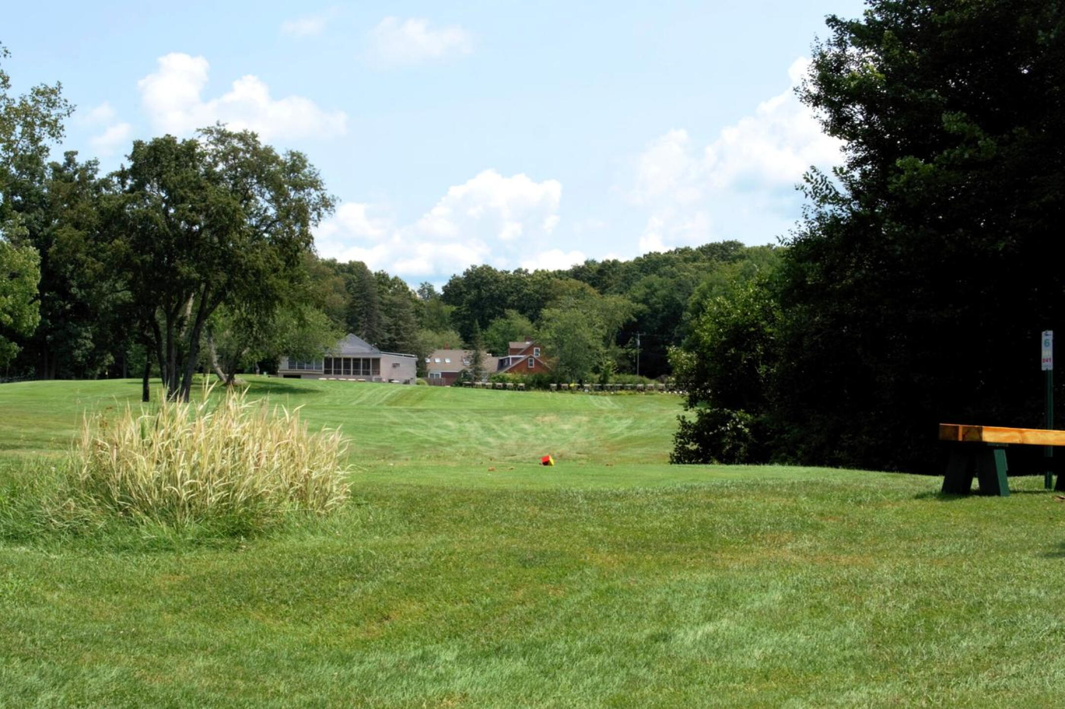 A view from fairway six, playing uphill to the green. This is one of the hole’s two fairways, seen from behind the women’s tee. (Photo submitted by AptlyLinked on 08/03/2023)