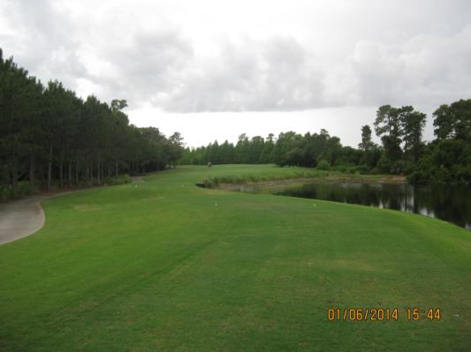 #11 Fairway from Tee box. Zig zag hole with trees to the Left and Water to the Right (swamp in those trees). (Photo submitted by Steve8905914 on 06/01/2014)