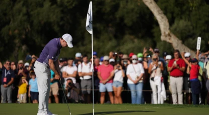 Estrella Damm N.A. Andalucia Masters - putting with the flagstick in 