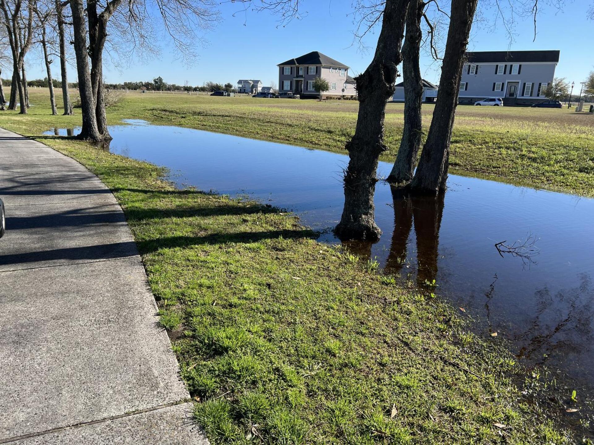 There were many, many areas like the one in this photo as well as partial cartpath wash-out (Photo submitted by u521079398 on 02/13/2023)