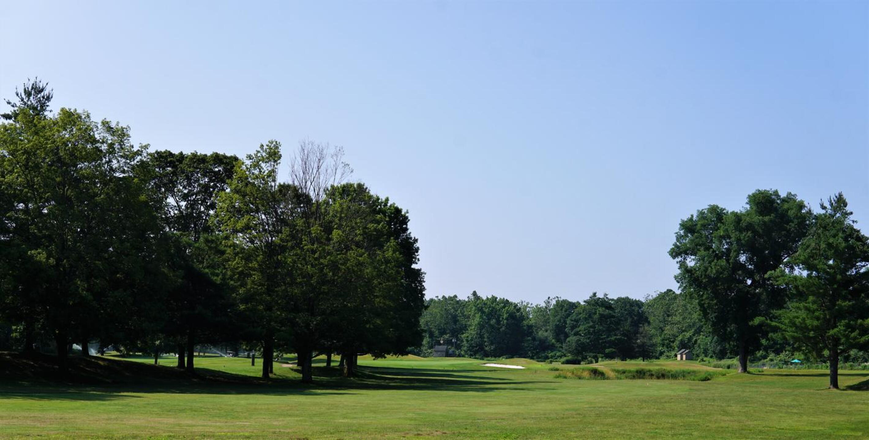 The sixth hole (par-4, 386 yards) bends around a dogleg to a slightly raised green. (Photo submitted by AptlyLinked on 07/08/2023)