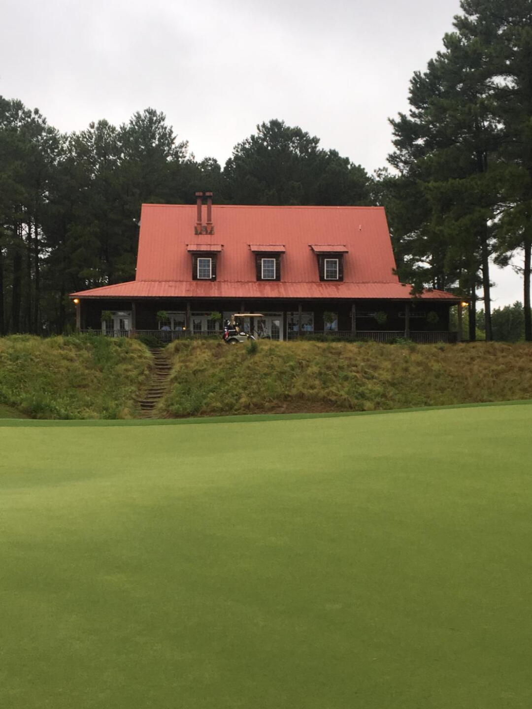The clubhouse from #18 green. (Photo submitted by DenisDotson on 08/25/2019)