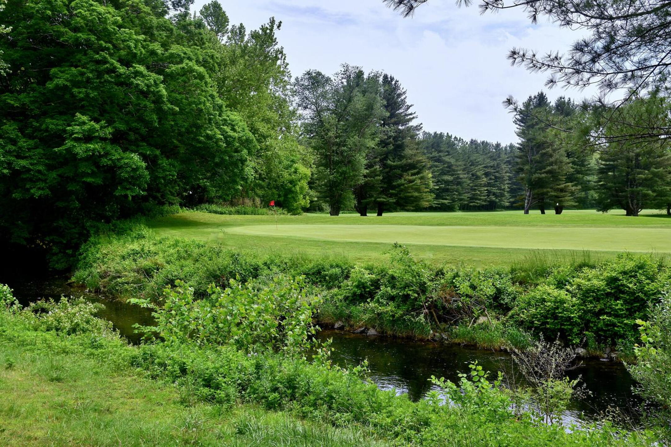 Ninth hole, par-4, 314 yards: A mishit wedge or 9-iron just won’t cut it when your approach shot “attempts” to cross the Pomperaug River. This is an excellent drive-and-pitch golf hole. (Photo submitted by AptlyLinked on 06/01/2025)