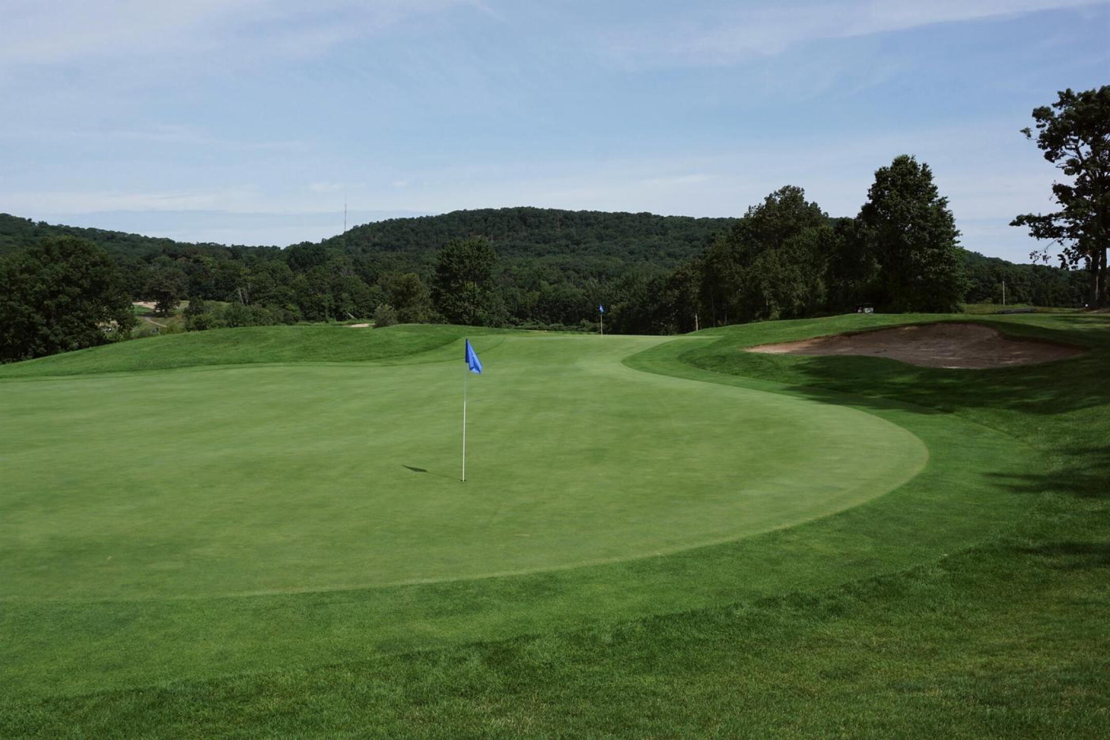 The immense and carefully sculpted double-green shared by holes seven and nine. (Photo submitted by AptlyLinked on 08/17/2021)