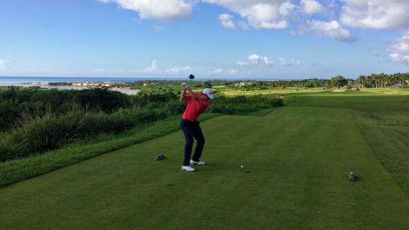 Golfer tees off at Casa de Campo