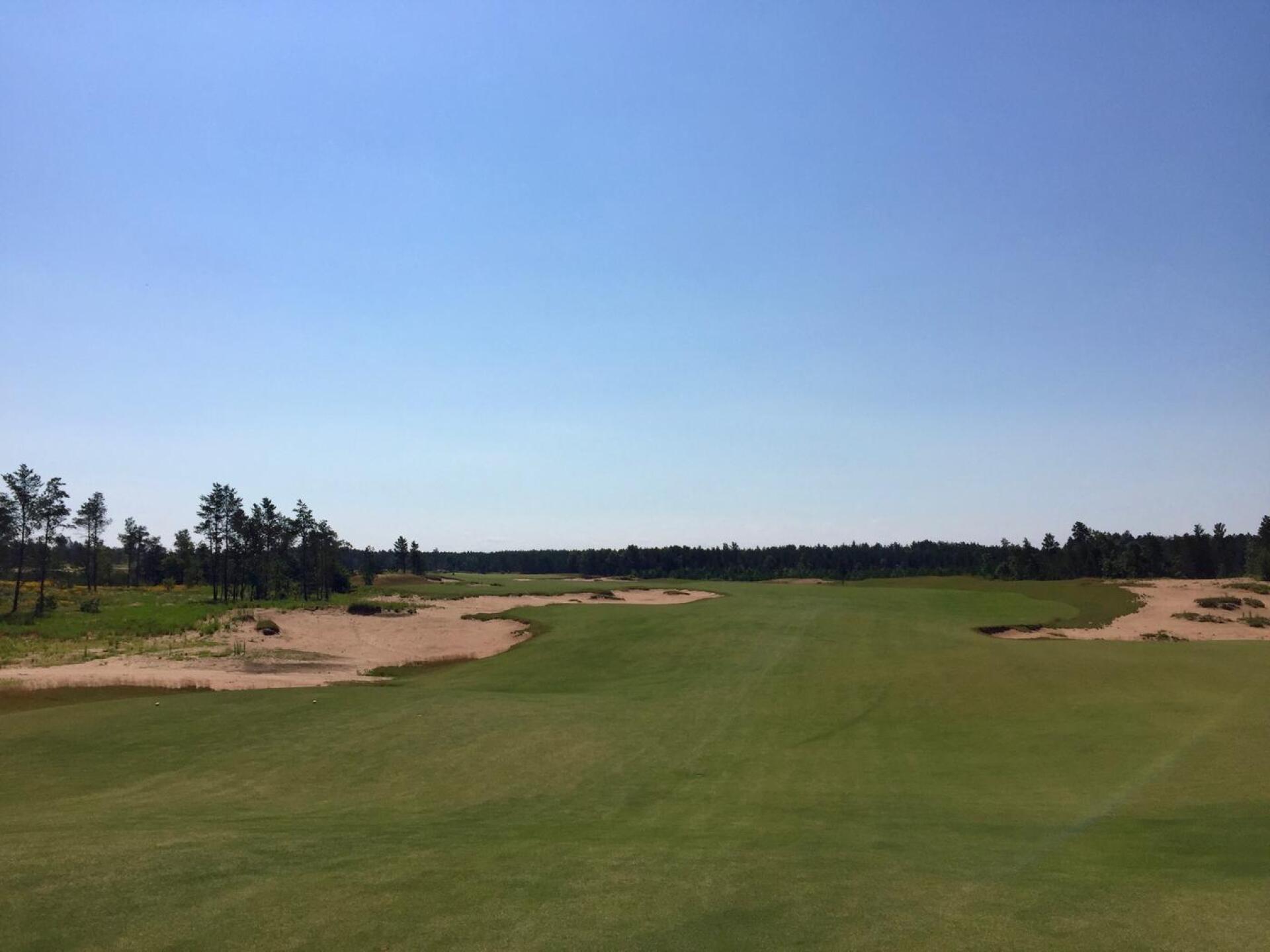 The par-4 6th at Sand Valley is a long bender to the left. (Photo submitted by TimGavrichGP on 11/21/2017)