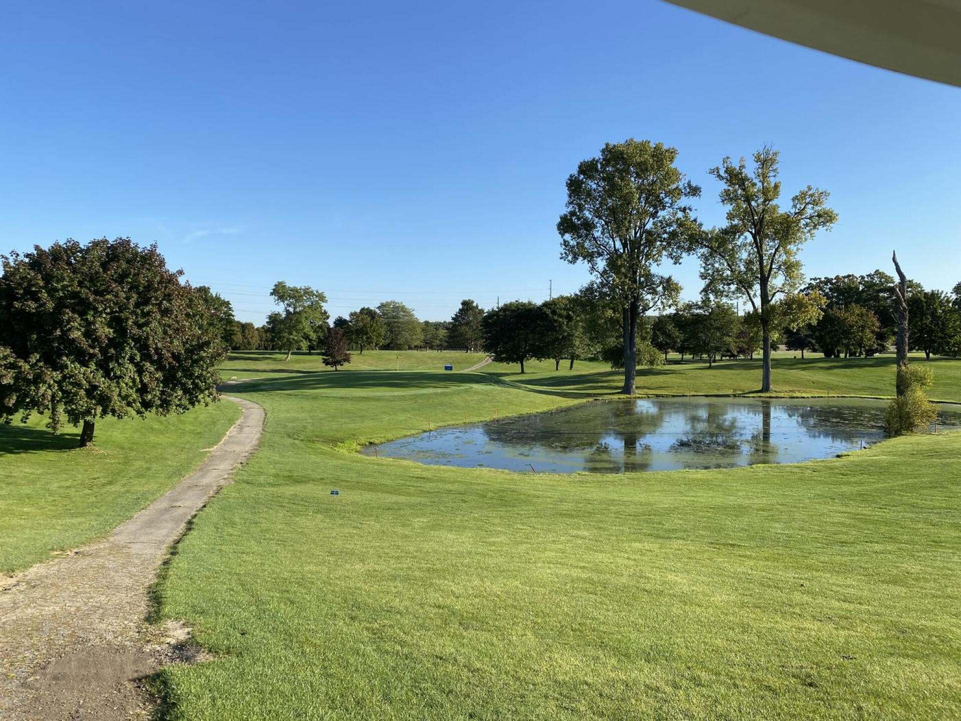 The 5th hole here is a par three with a carry over water. The green is slightly crowned so it plays small. A picturesque hole. (Photo submitted by BuffaloBen15 on 01/04/2022)