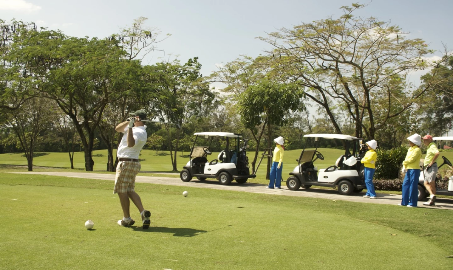 Thailand golf vacation - caddies and carts