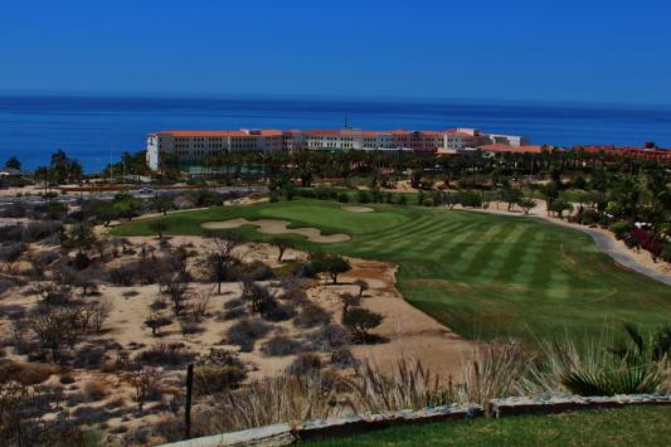 The 12th hole at Cabo Real Golf Club overlooks the Hilton hotel and the Sea of Cortez. (Photo submitted by JasonDeeganGA on 02/11/2014)