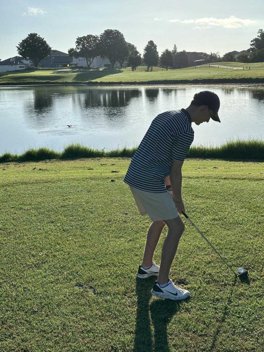 Teeing off on a par 3 over a large gator. The video is 3 baby gators eating a carp on the side of a tee box. (Photo submitted by TrashA10 on 07/01/2024)