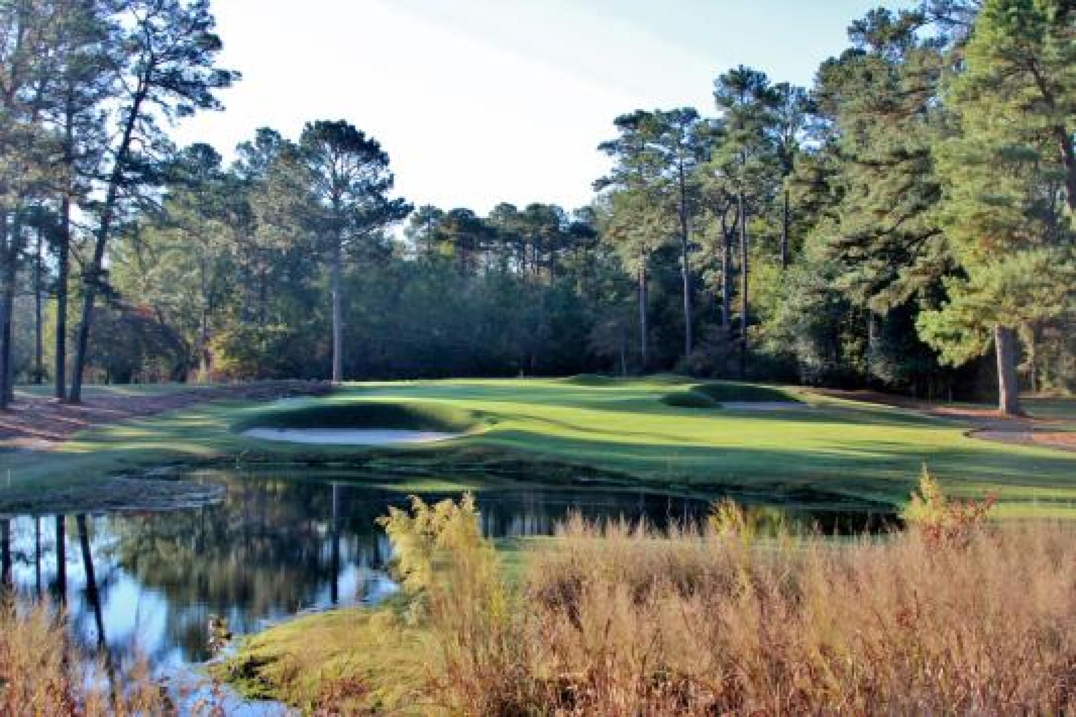 The second hole at Pine Needles plays over water. (Photo submitted by JasonDeeganGA on 12/20/2013)