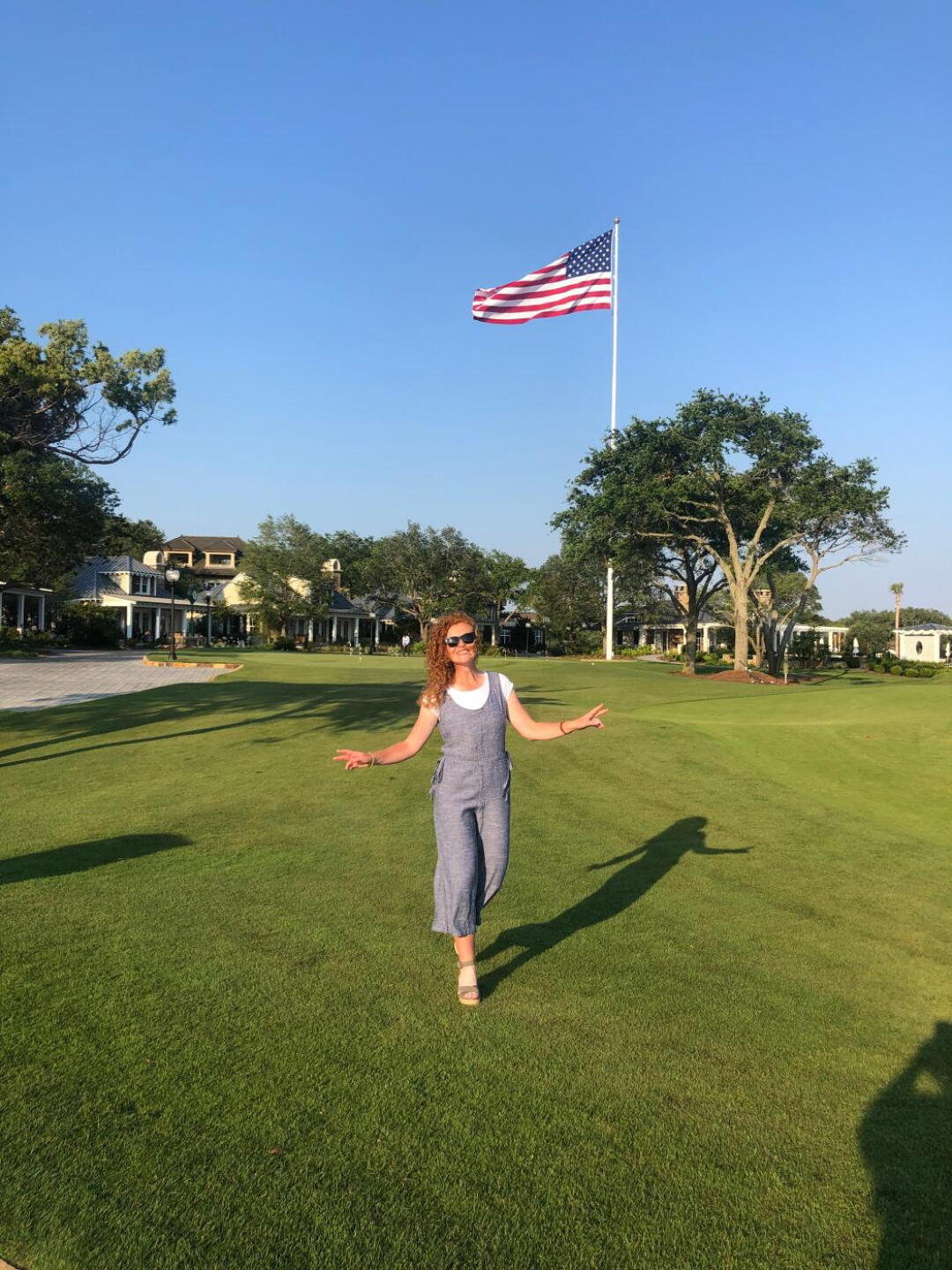 Posing with the most stunning facilities and the most beautiful flag ion the world! USA (Photo submitted by ynNQEnQCxVmcwmvu00ZQ on 11/20/2019)
