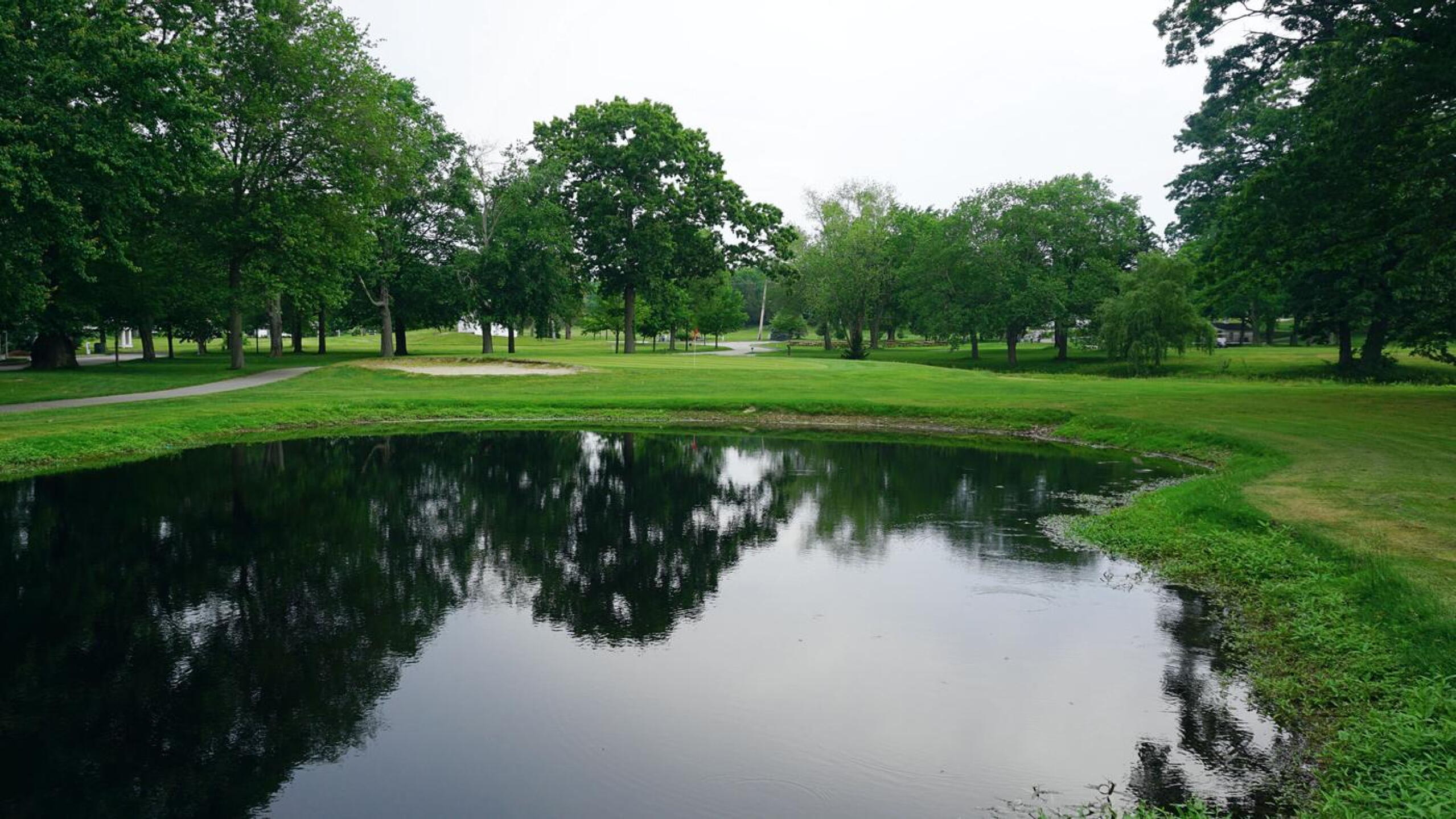 Eighteen: The closer, a 344-yard par-4, features a pond within the holes last 100 yards. (Photo submitted by AptlyLinked on 06/09/2021)
