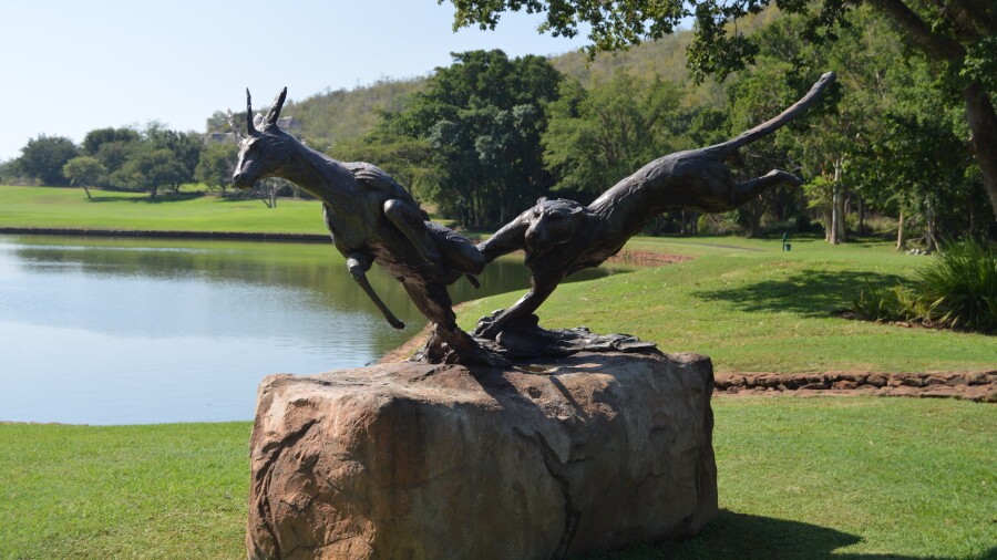 Leopard Creek C.C. - leopard statue