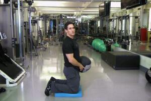 Module 02: Segment 04: Exercise 3 - Kneeling Overhead Smash