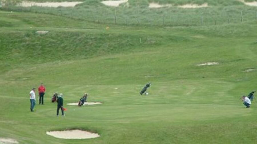 Harris GC: Golfers on the 4th green