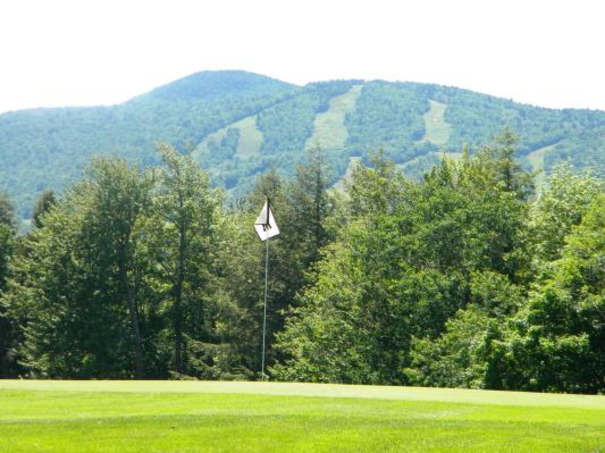 6th hole green with Haystack Mountain in the background (Photo submitted by uXPCN8935XP on 06/18/2014)