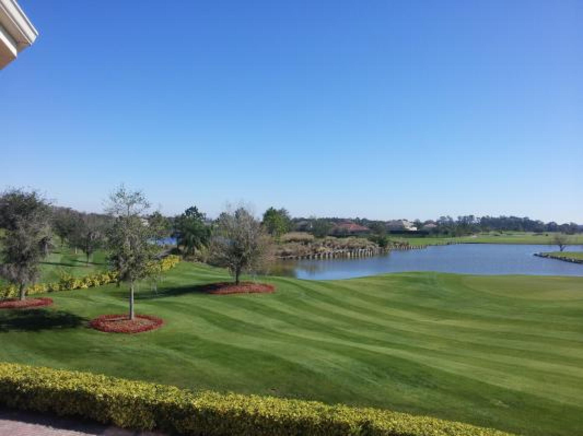 Looking from clubhouse...range is to left (hidden), 18th green to right (Photo submitted by lindamac43 on 01/02/2013)