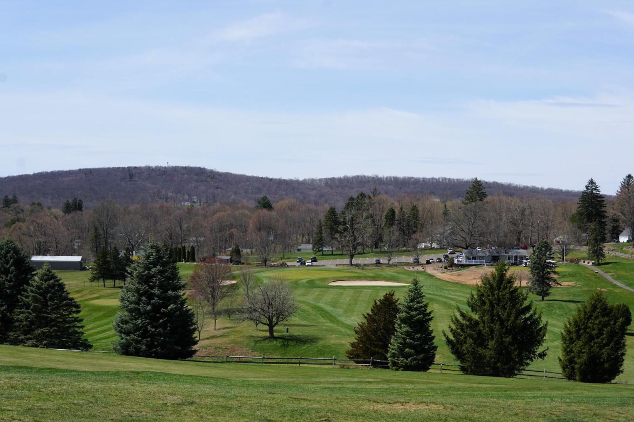 As seen from the 5th fairway, a long view back to the clubhouse environs. (Photo submitted by AptlyLinked on 04/13/2023)