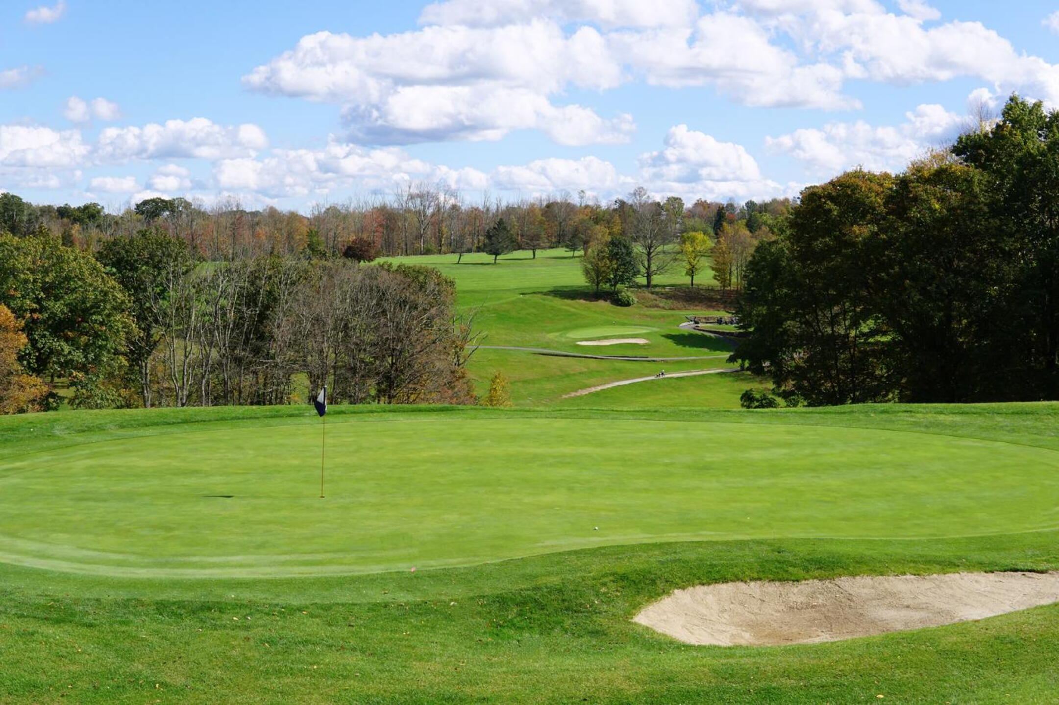 A short par-4 that presents a long vista from behind its green, the sixth challenges you from tee to green. (Photo submitted by AptlyLinked on 10/10/2023)
