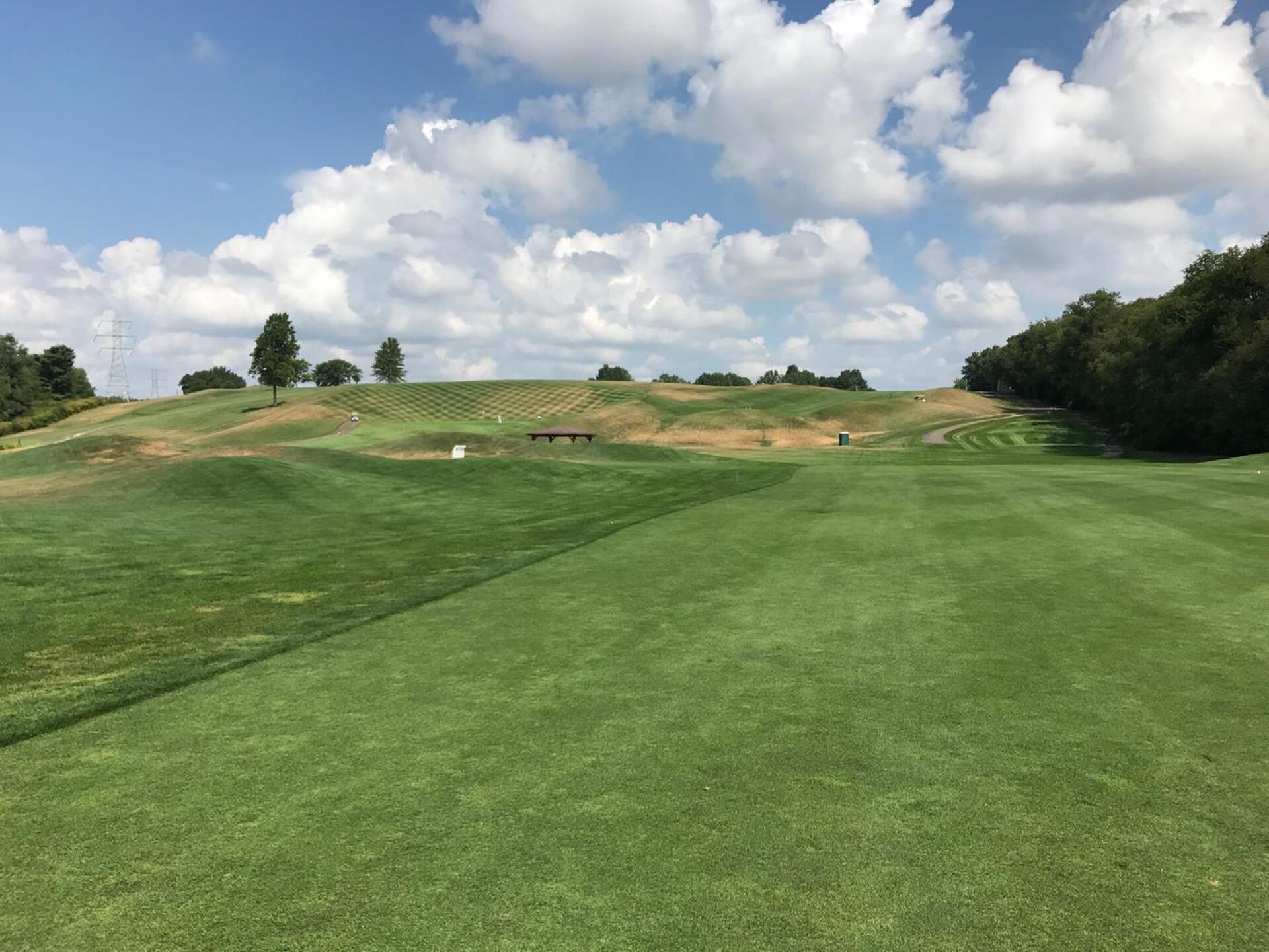 From the Fifth fairway, looking back at fifth tee, fourth green and fairway, sixth fairway and green to the far left. (Photo submitted by carolinadad on 08/30/2017)