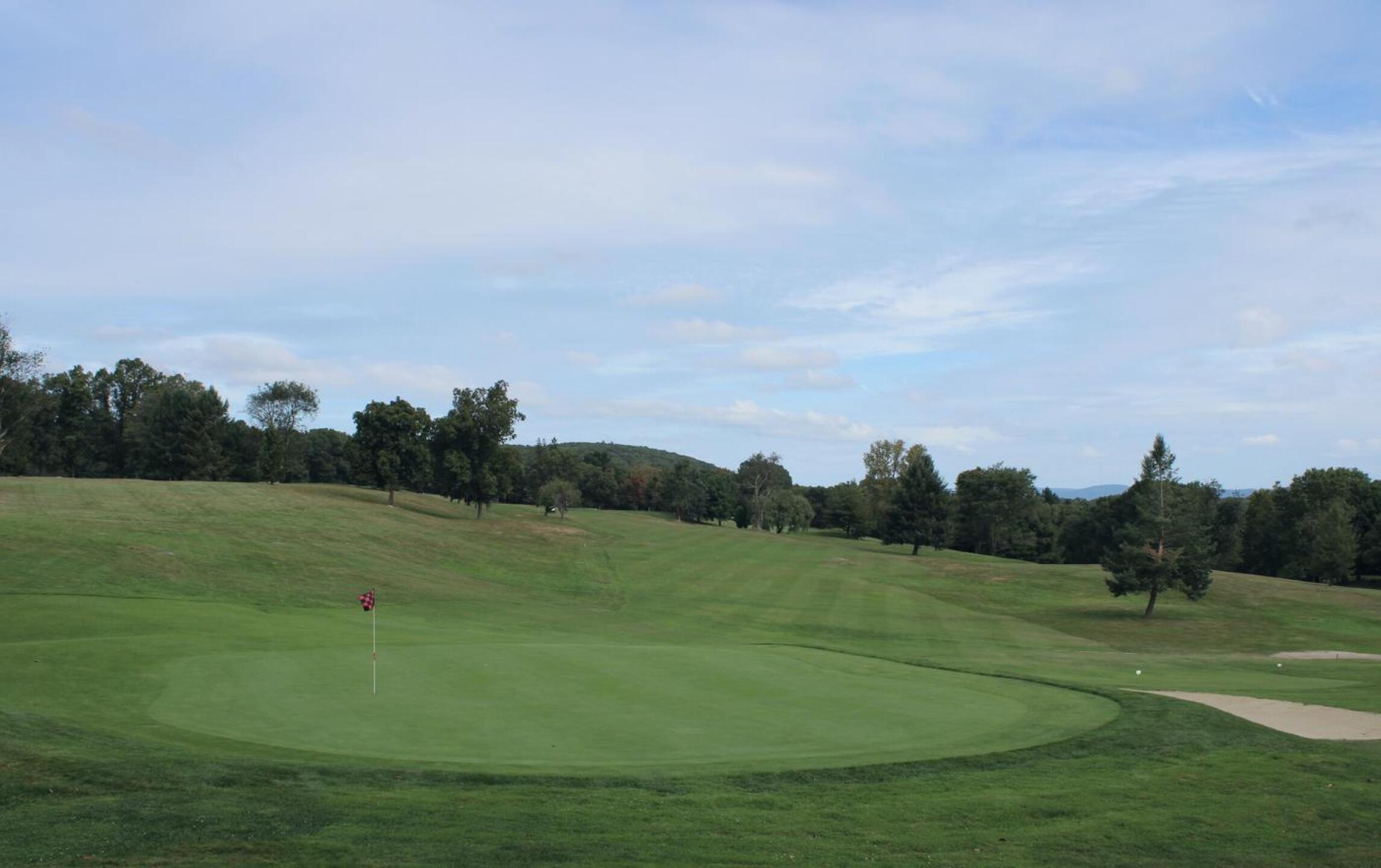 The eighth green, where rolling hills fall away into a handsome backdrop. (Photo submitted by AptlyLinked on 09/23/2024)