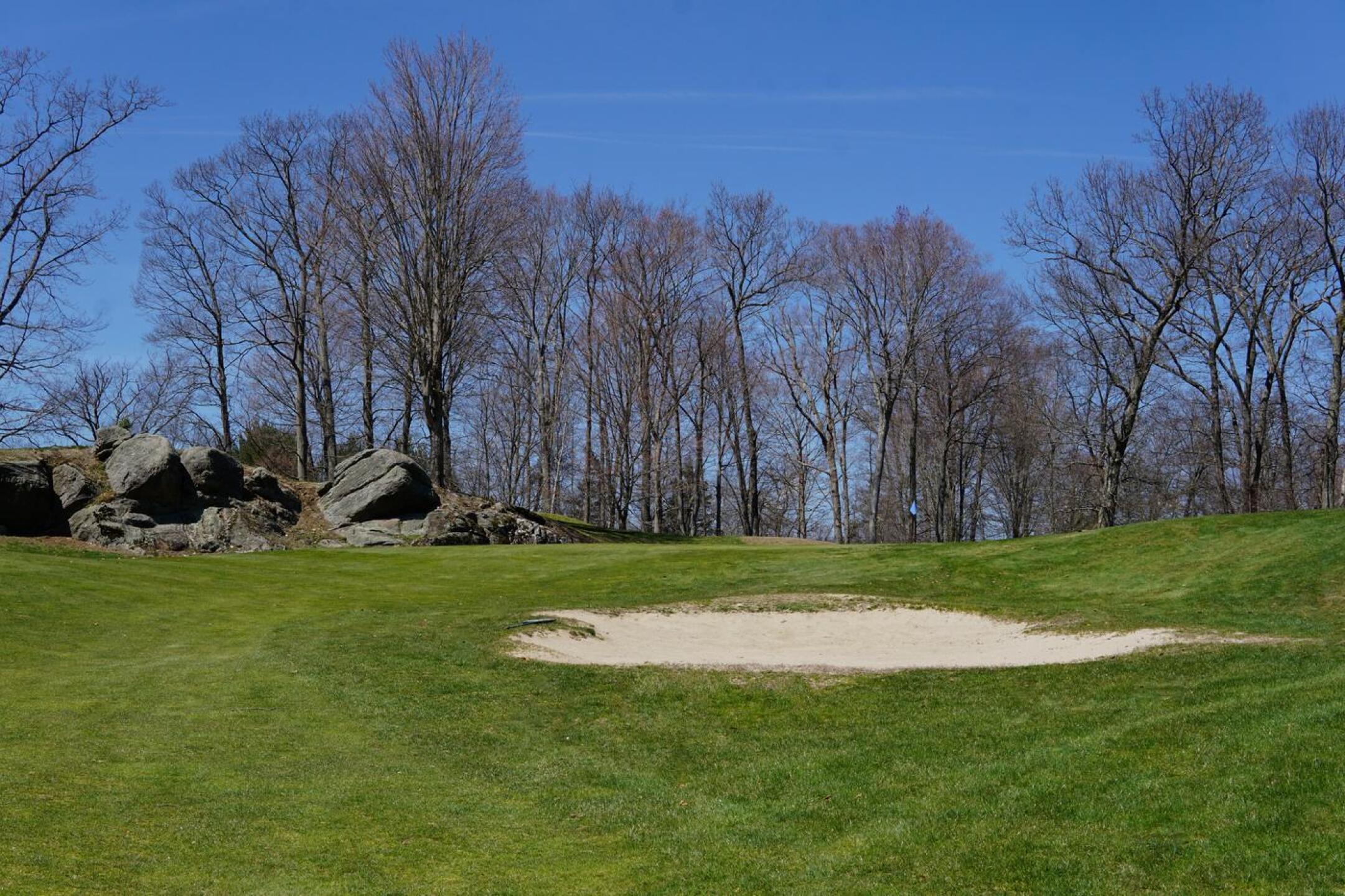Granite rock forms punctuate the area around green eight. (Photo submitted by AptlyLinked on 04/12/2023)