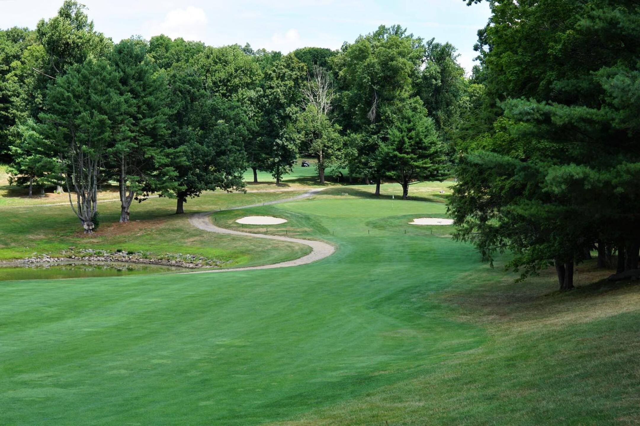 7th: par-4, 370. Woodhaven is a strong test of driving. Here, the downhill tee shot is tight, the approach more routine. (Photo submitted by AptlyLinked on 07/29/2022)