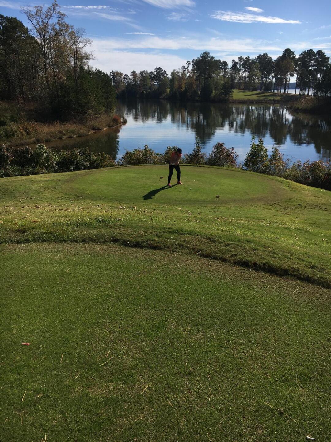 Sharon hits over the inlet to the uphill par 3 (Photo submitted by PKStamm2418 on 11/24/2020)