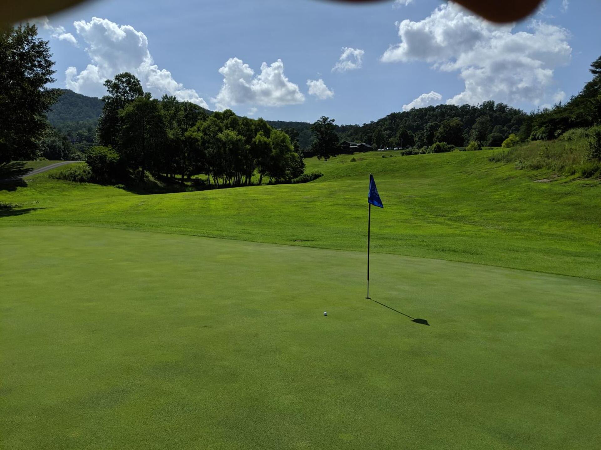 165 yd par 3 number 10 hole looking back at tbox and clubhouse beyond. (Photo submitted by bmcrawley on 07/09/2019)