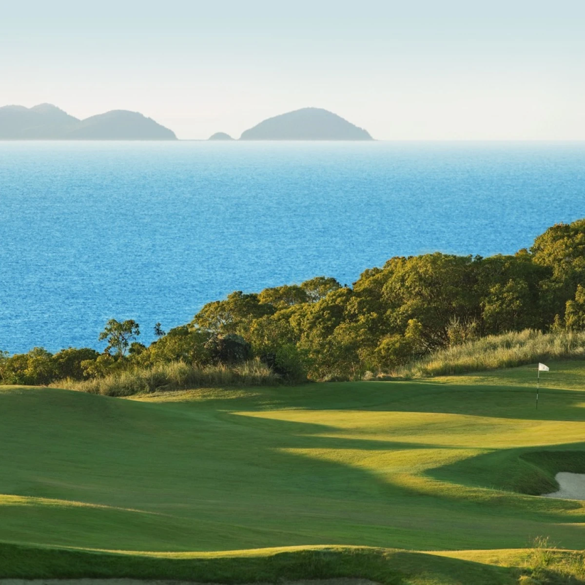 Golf along the Great Barrier Reef at Hamilton Island Golf Club in ...