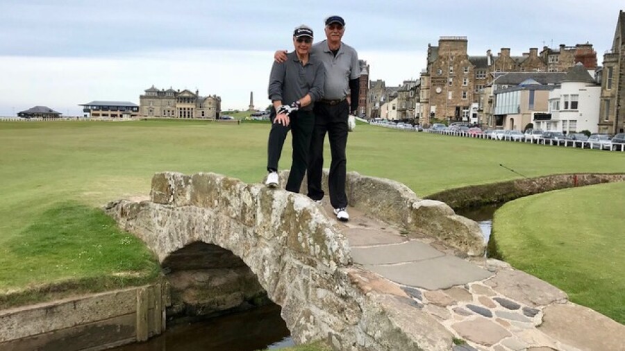 Golf buddies on the Swilcan Bridge