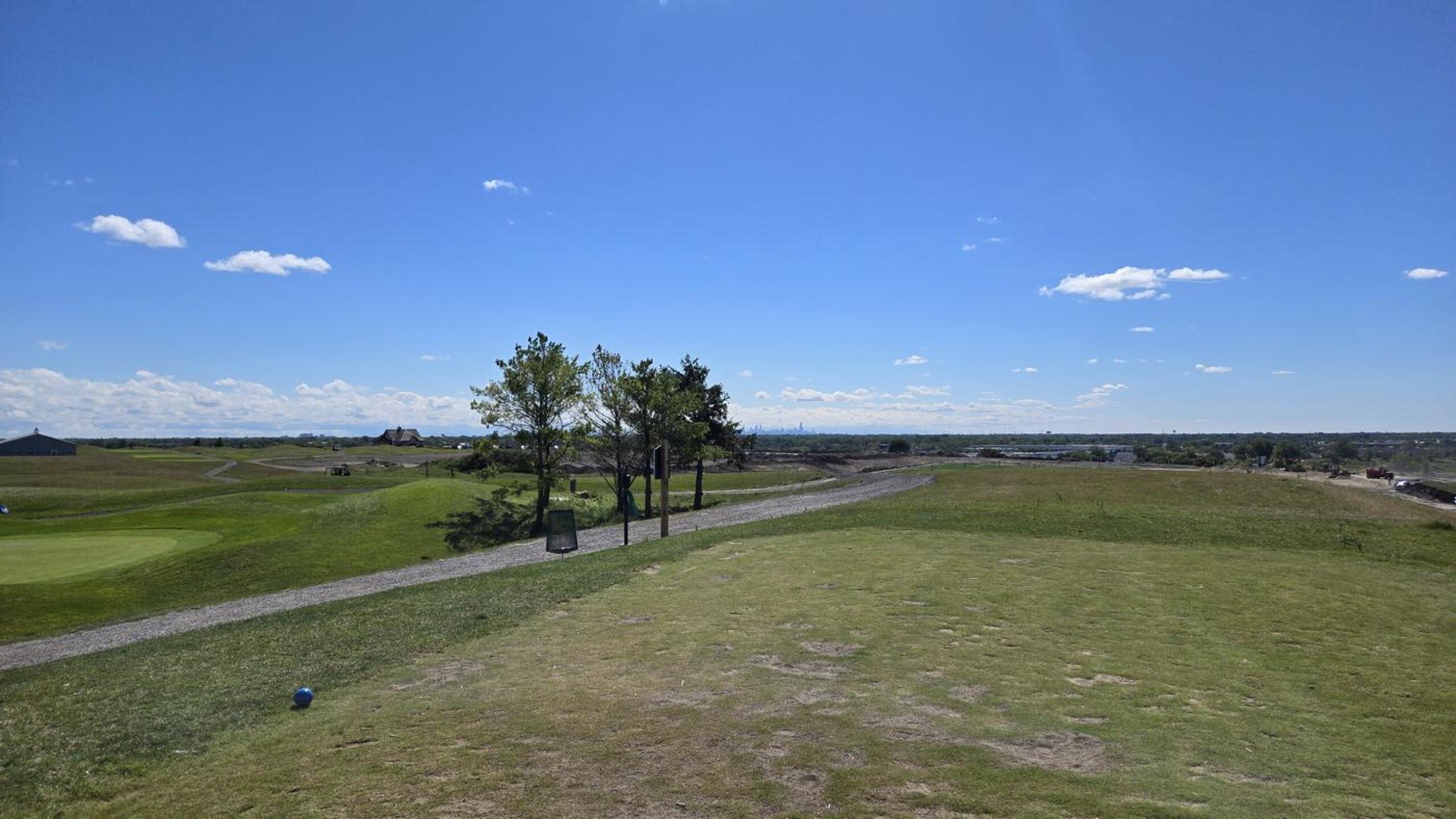 View from 7th tee towards the city, tee box is a bit beat up (Photo submitted by gpark17 on 09/09/2024)