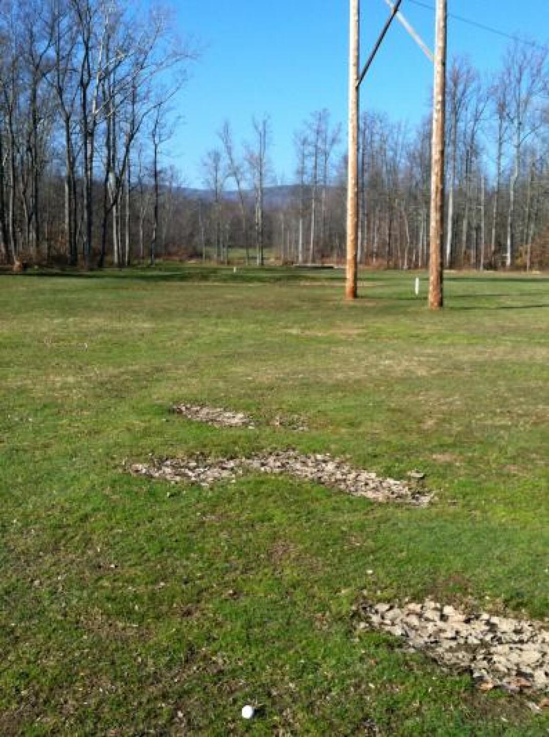 "Approach" shot on 13 from middle of "fairway". You have to hit through or around the power poles from 250 out (Photo submitted by DrOldSchool on 11/21/2012)